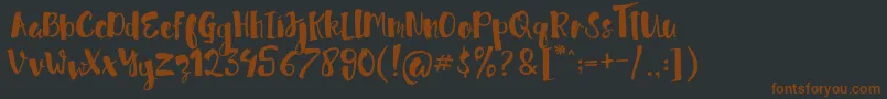 Шрифт jellysugar Free Demo – коричневые шрифты на чёрном фоне