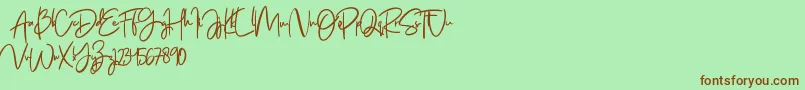 Jenifa free Font – Brown Fonts on Green Background