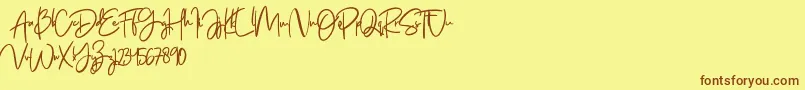 Jenifa free Font – Brown Fonts on Yellow Background