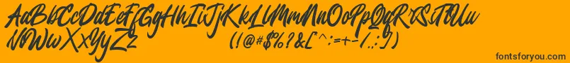 Jesselyne FREE Font – Black Fonts on Orange Background