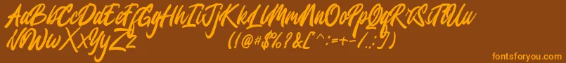 Jesselyne FREE Font – Orange Fonts on Brown Background