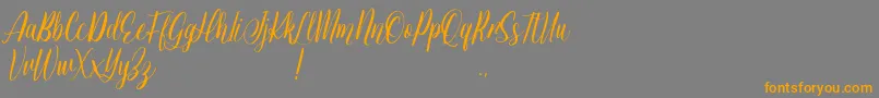 Шрифт Jessie Odelya Demo – оранжевые шрифты на сером фоне