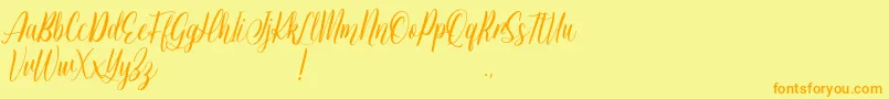 フォントJessie Odelya Demo – オレンジの文字が黄色の背景にあります。