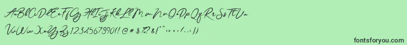 Fonte JesterBrush – fontes pretas em um fundo verde
