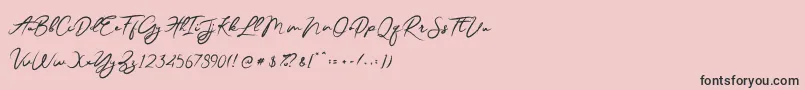 Fonte JesterBrush – fontes pretas em um fundo rosa