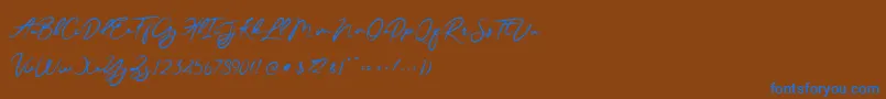 JesterBrush-Schriftart – Blaue Schriften auf braunem Hintergrund