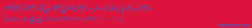 JesterBrush-Schriftart – Blaue Schriften auf rotem Hintergrund