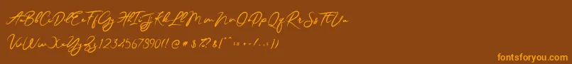 JesterBrush Font – Orange Fonts on Brown Background