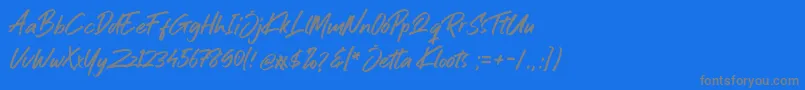 Jetta Kloots Font-Schriftart – Graue Schriften auf blauem Hintergrund