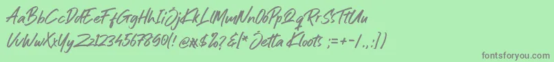 Jetta Kloots Font-Schriftart – Graue Schriften auf grünem Hintergrund