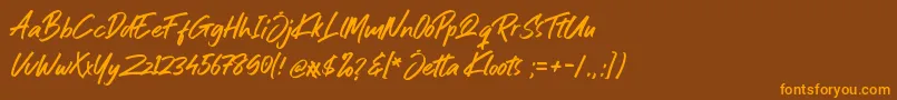 Шрифт Jetta Kloots Font – оранжевые шрифты на коричневом фоне