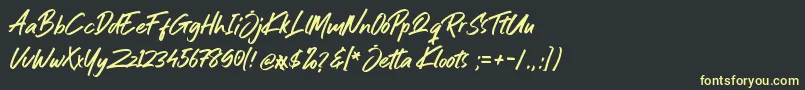 Jetta Kloots Font-Schriftart – Gelbe Schriften auf schwarzem Hintergrund