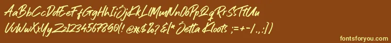 Jetta Kloots Font Font – Yellow Fonts on Brown Background