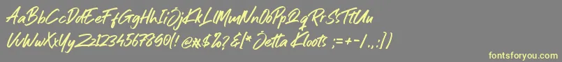 Шрифт Jetta Kloots Font – жёлтые шрифты на сером фоне