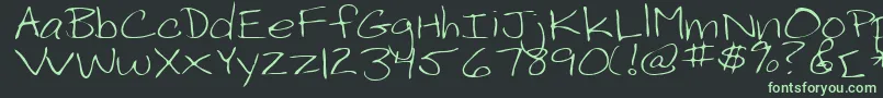 PelotaRegular-Schriftart – Grüne Schriften auf schwarzem Hintergrund