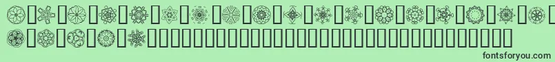 フォントJI Kaleidoscope Bats 5 – 緑の背景に黒い文字
