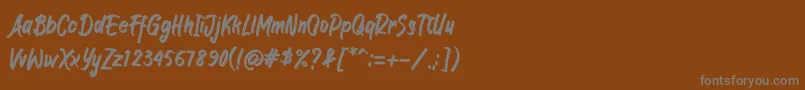 Шрифт JIANGKRIK – серые шрифты на коричневом фоне