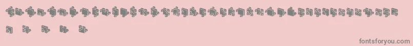 フォントJigsawPuzzles3DFilled – ピンクの背景に灰色の文字