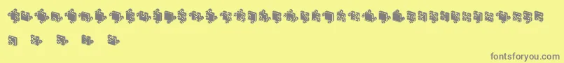 フォントJigsawPuzzles3DFilled – 黄色の背景に灰色の文字