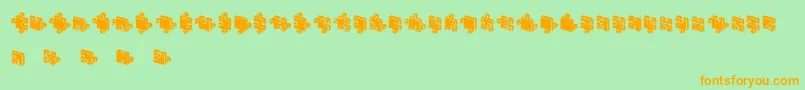 Czcionka JigsawPuzzles3DFilled – pomarańczowe czcionki na zielonym tle