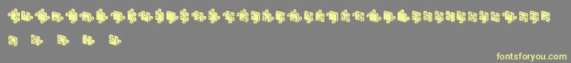Шрифт JigsawPuzzles3DFilled – жёлтые шрифты на сером фоне