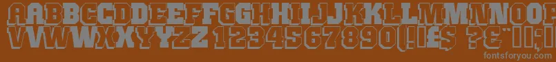 JIMTH   -fontti – harmaat kirjasimet ruskealla taustalla