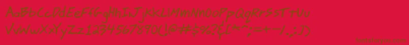 jmacscrl Font – Brown Fonts on Red Background