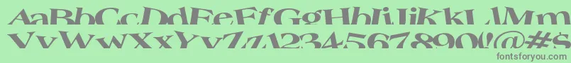 Troug-fontti – harmaat kirjasimet vihreällä taustalla