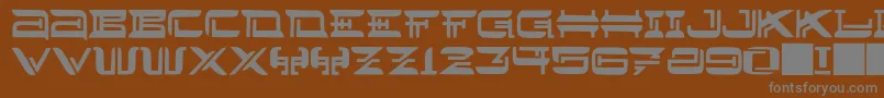 フォントJMH Lee West – 茶色の背景に灰色の文字