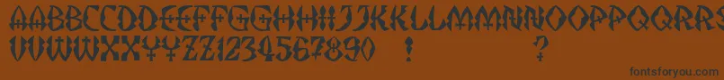 フォントJMH Strigoi II – 黒い文字が茶色の背景にあります