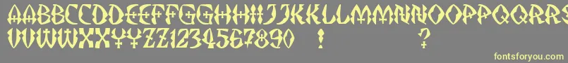 フォントJMH Strigoi II – 黄色のフォント、灰色の背景