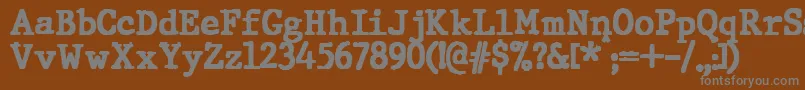 JMH Typewriter Black Font – Gray Fonts on Brown Background
