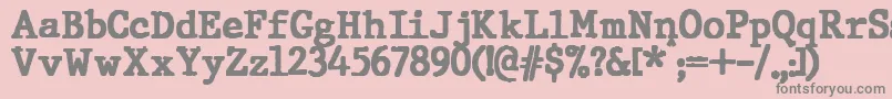 フォントJMH Typewriter Black – ピンクの背景に灰色の文字