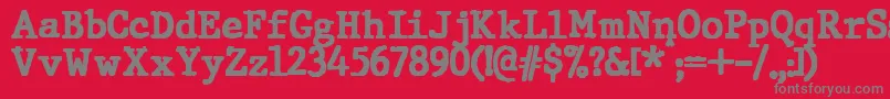 Czcionka JMH Typewriter Black – szare czcionki na czerwonym tle