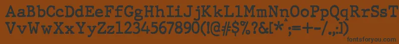 JMH Typewriter Bold Font – Black Fonts on Brown Background