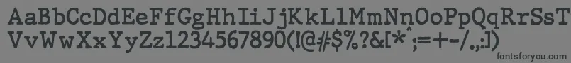 フォントJMH Typewriter Bold – 黒い文字の灰色の背景