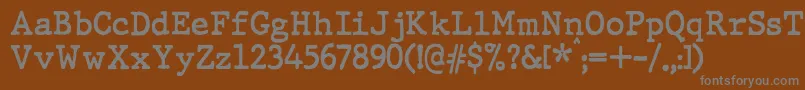 Шрифт JMH Typewriter Bold – серые шрифты на коричневом фоне