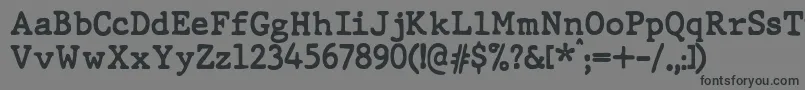 Шрифт JMH Typewriter dry Bold – чёрные шрифты на сером фоне