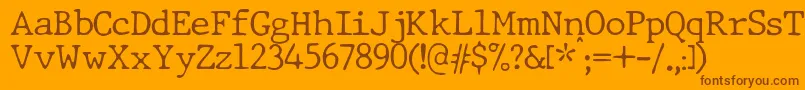 Więcej informacji o czcionce JMH Typewriter dry Thin Czcionka JMH Typewriter dry Thin – brązowe czcionki na pomarańczowym tle