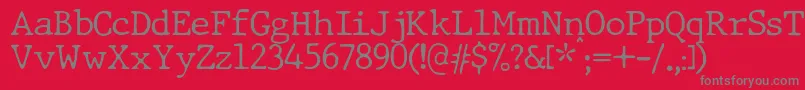 Шрифт JMH Typewriter dry Thin – серые шрифты на красном фоне