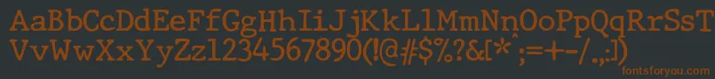 Шрифт JMH Typewriter dry – коричневые шрифты на чёрном фоне