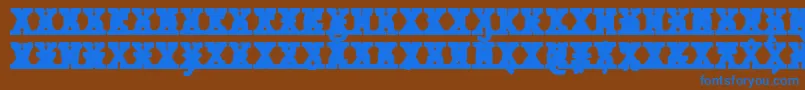 JMH Typewriter mono Black Cross Font – Blue Fonts on Brown Background