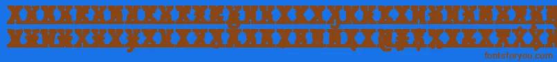 フォントJMH Typewriter mono Black Cross – 茶色の文字が青い背景にあります。