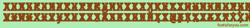 フォントJMH Typewriter mono Black Cross – 緑の背景に茶色のフォント