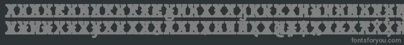 JMH Typewriter mono Black Cross-fontti – harmaat kirjasimet mustalla taustalla