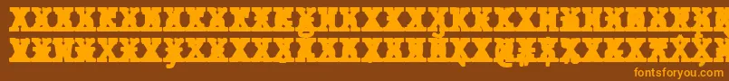 フォントJMH Typewriter mono Black Cross – オレンジ色の文字が茶色の背景にあります。