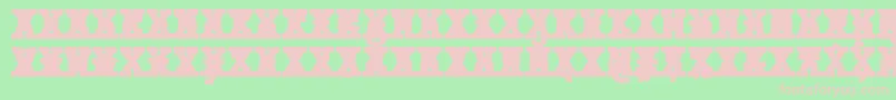 Czcionka JMH Typewriter mono Black Cross – różowe czcionki na zielonym tle
