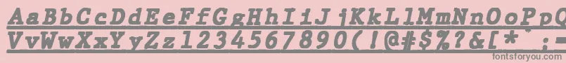 フォントJMH Typewriter mono Black Italic Under – ピンクの背景に灰色の文字