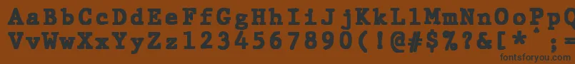 JMH Typewriter mono Black-Schriftart – Schwarze Schriften auf braunem Hintergrund