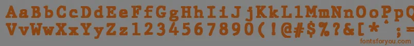 JMH Typewriter mono Black-Schriftart – Braune Schriften auf grauem Hintergrund